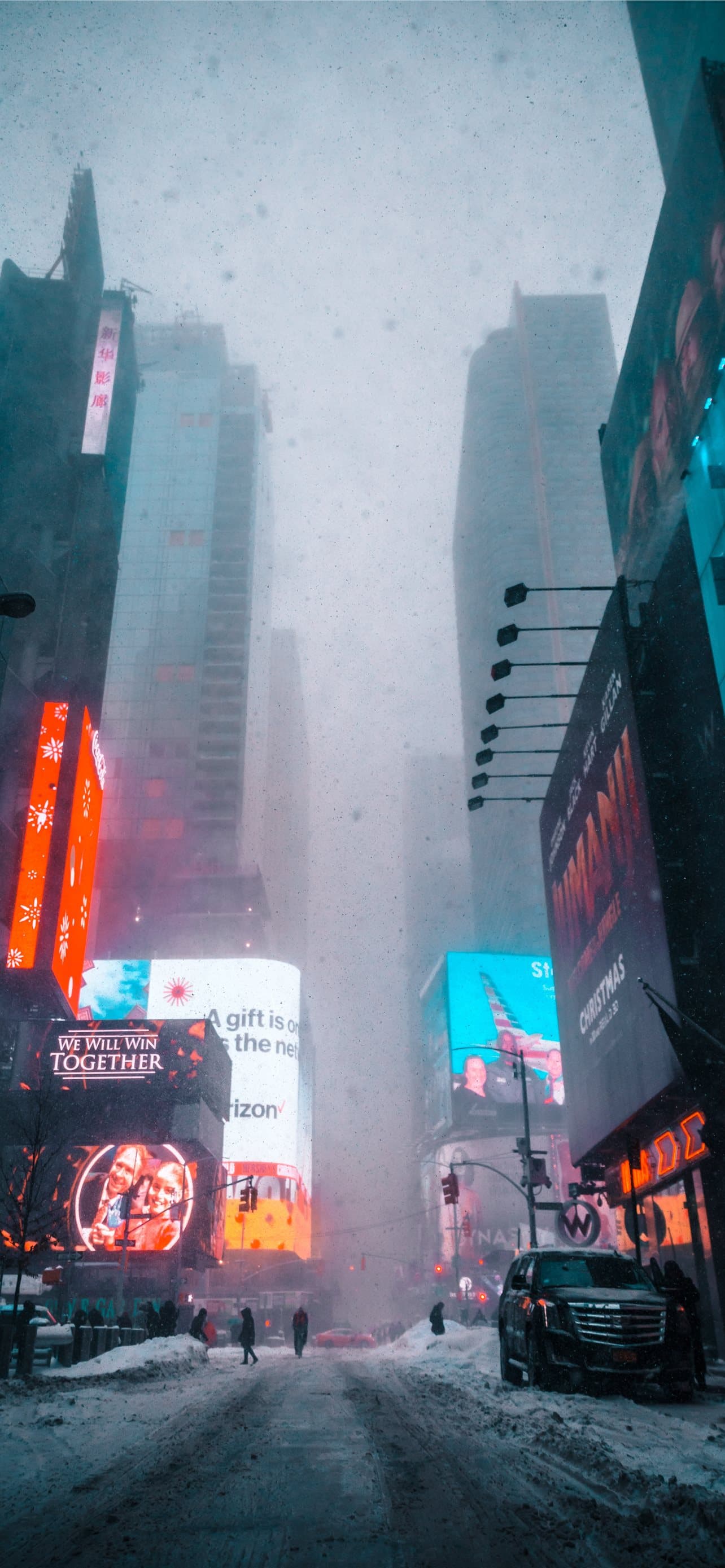 People Waling On Street Covered With Fog