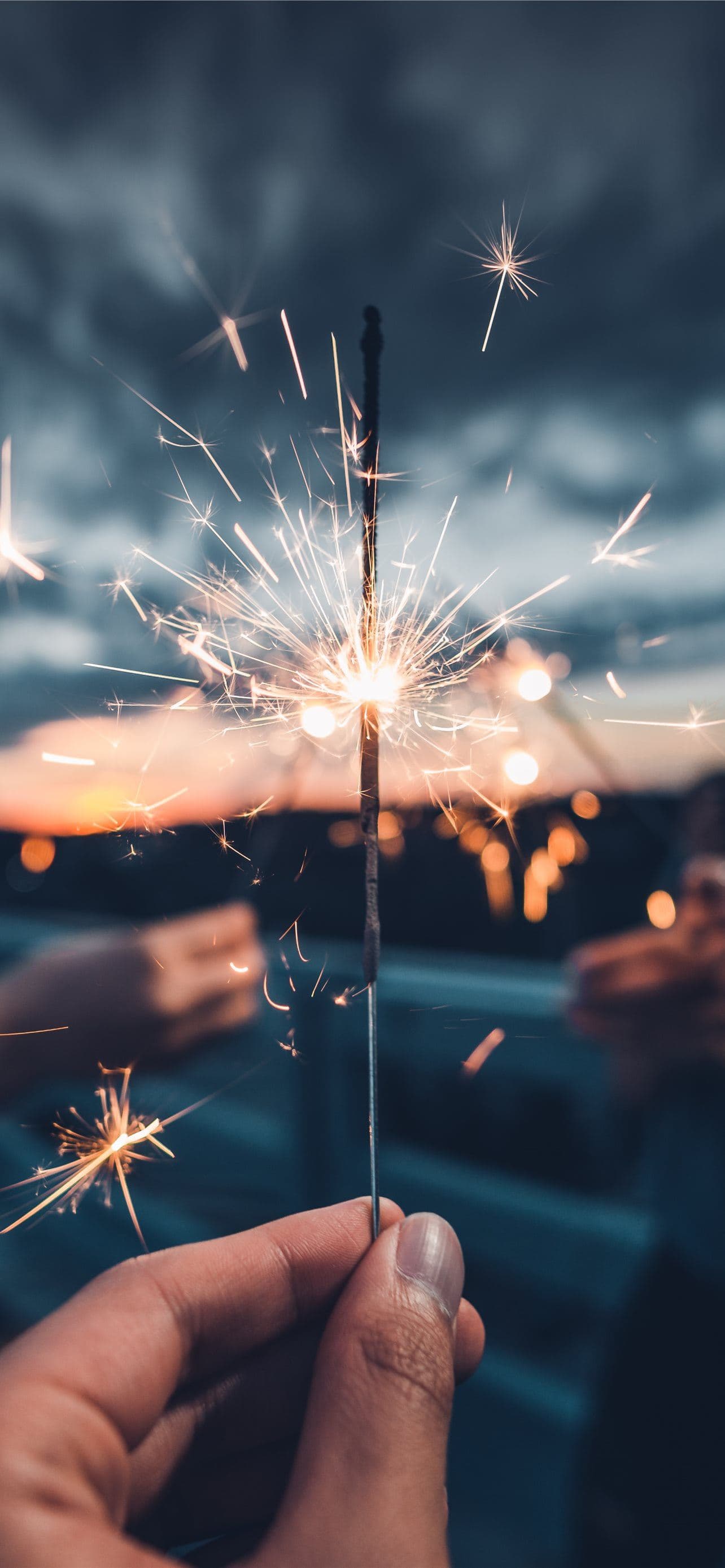 Photo Of Person Holding Lighted Sparkler