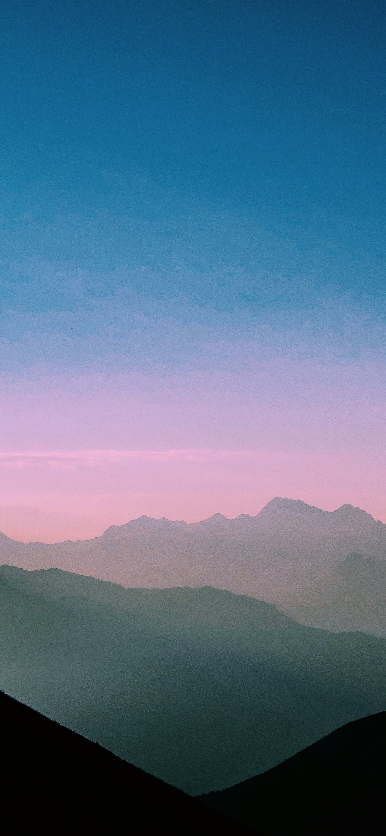 Aerial View Of Foggy Mountains